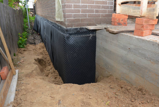 Happy homeowners after waterproofing job in Owensville